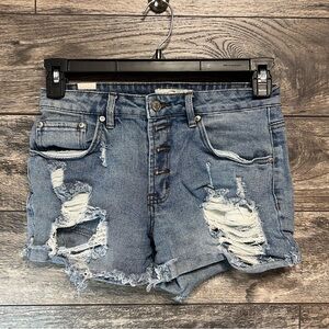 Almost Famous distressed denim shorts in size 5.